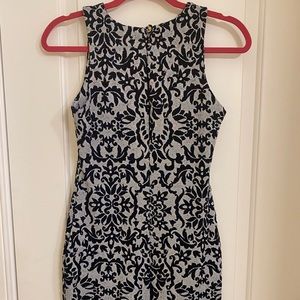 Blue and gray floral body con dress perfect for wedding guest